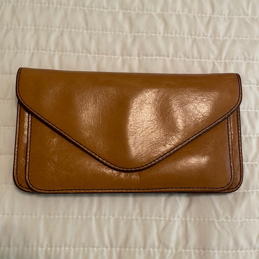 Hobo wallet with wrist strap.